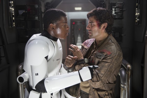 Star Wars: The Force Awakens..L to R: Finn (John Boyega) and Poe Dameron (Oscar Isaac)..Ph: David James..? 2015 Lucasfilm Ltd. & TM. All Right Reserved.
